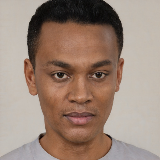 Neutral black young-adult male with short  black hair and brown eyes