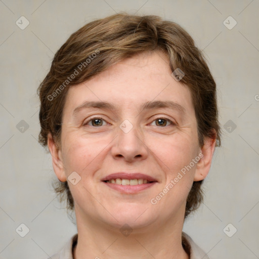 Joyful white adult female with medium  brown hair and grey eyes