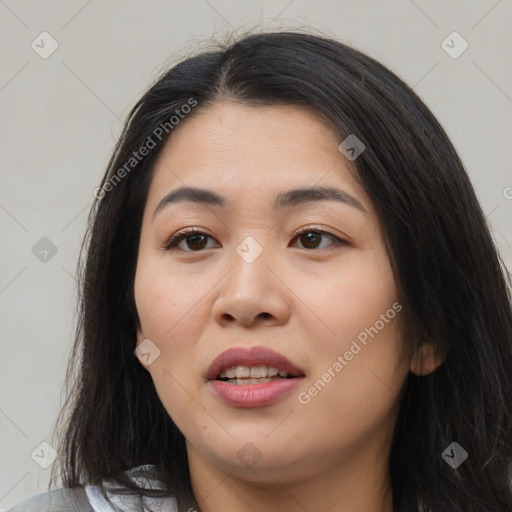 Joyful asian young-adult female with medium  black hair and brown eyes