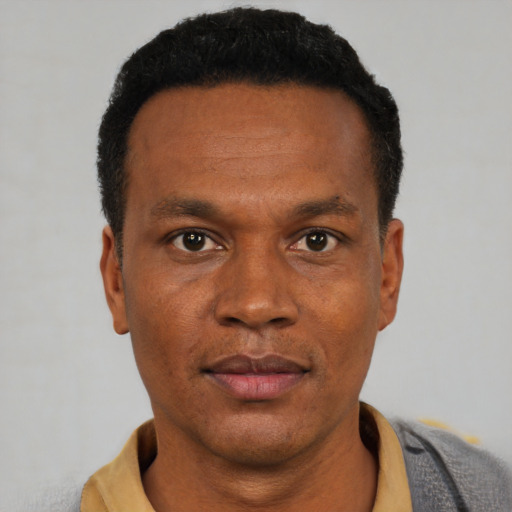 Neutral latino adult male with short  black hair and brown eyes