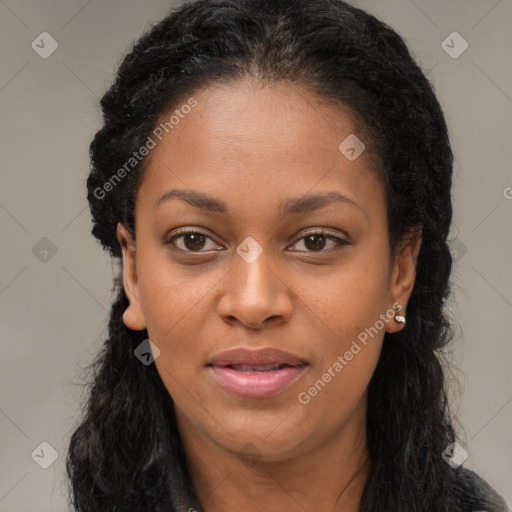 Joyful black young-adult female with long  brown hair and brown eyes