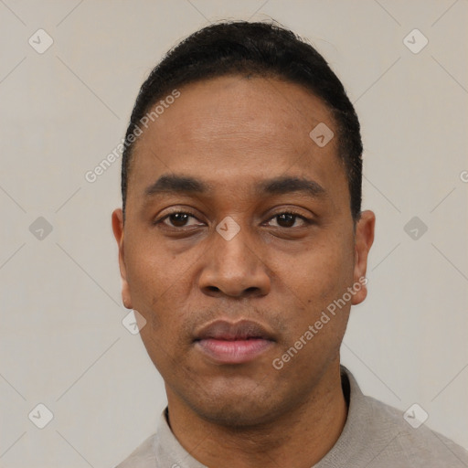 Neutral black young-adult male with short  black hair and brown eyes