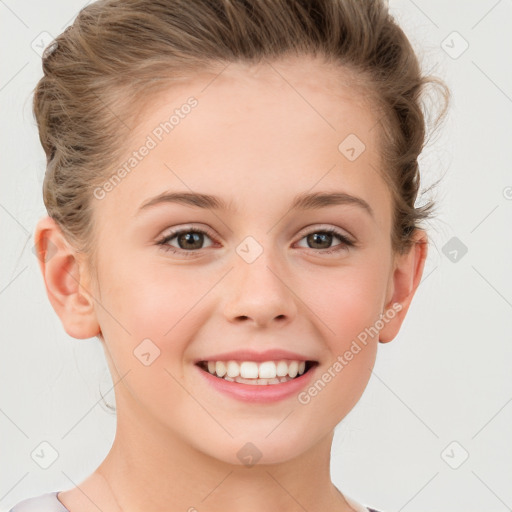 Joyful white child female with short  brown hair and brown eyes