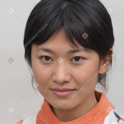 Joyful asian young-adult female with medium  brown hair and brown eyes