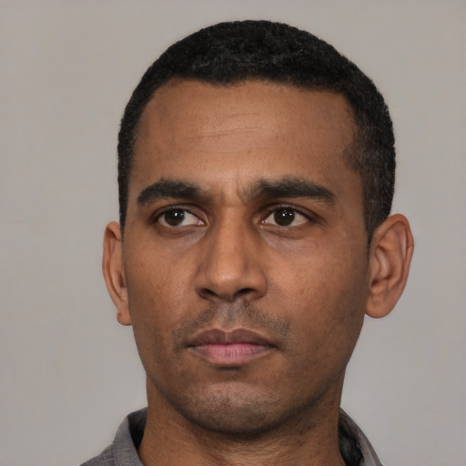 Neutral latino adult male with short  black hair and brown eyes