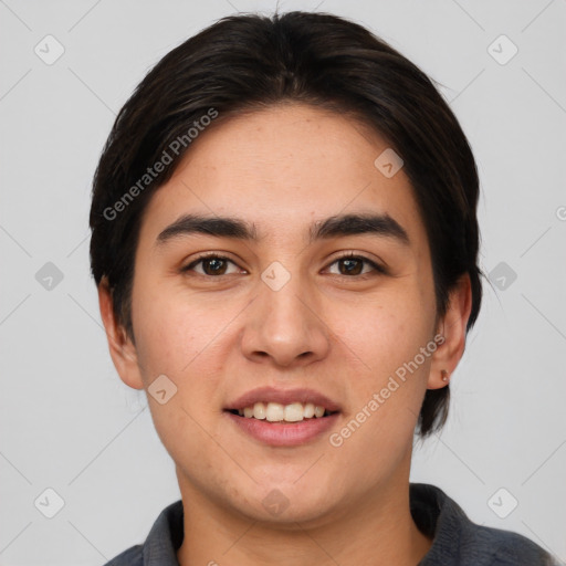 Joyful white young-adult male with short  black hair and brown eyes