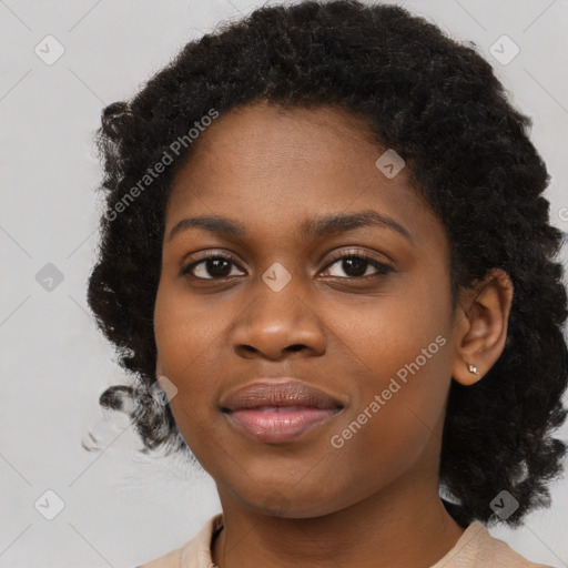 Joyful black young-adult female with medium  black hair and brown eyes