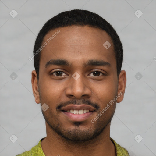 Joyful black young-adult male with short  black hair and brown eyes