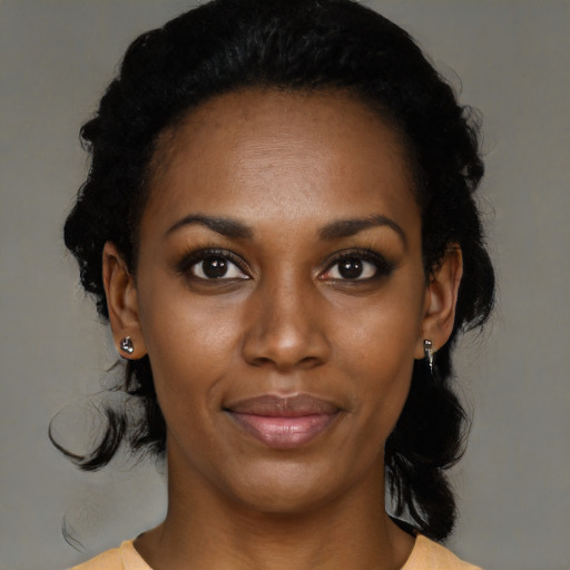 Neutral black young-adult female with medium  black hair and brown eyes