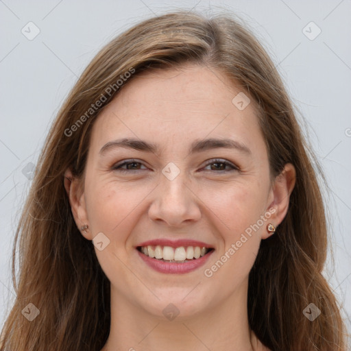 Joyful white young-adult female with long  brown hair and grey eyes