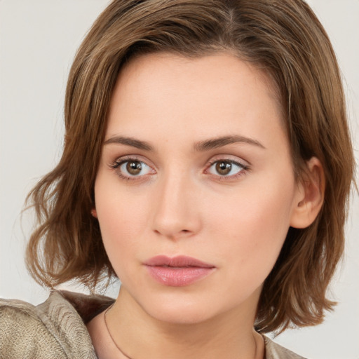 Neutral white young-adult female with medium  brown hair and brown eyes