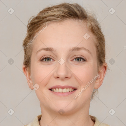 Joyful white young-adult female with medium  brown hair and blue eyes