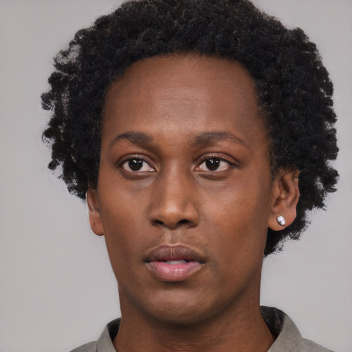 Neutral black young-adult female with short  black hair and brown eyes
