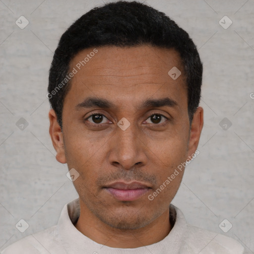 Neutral latino young-adult male with short  black hair and brown eyes