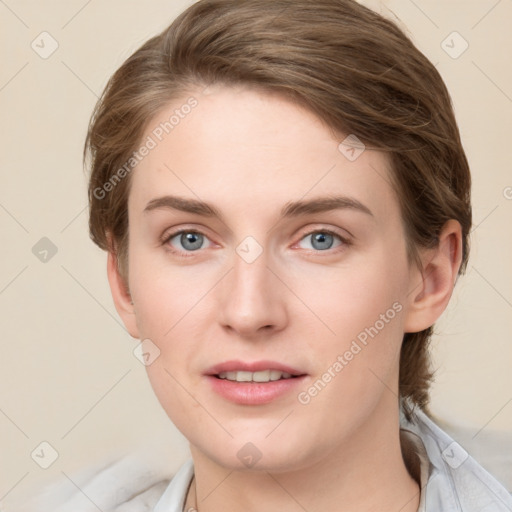 Joyful white young-adult female with medium  brown hair and blue eyes