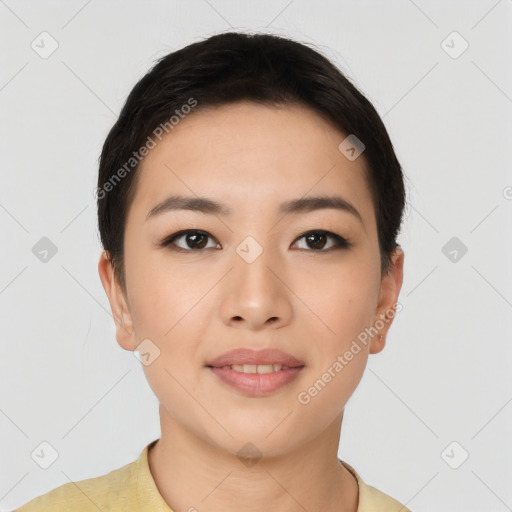 Joyful asian young-adult female with short  black hair and brown eyes