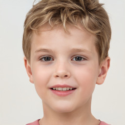 Joyful white child male with short  brown hair and brown eyes