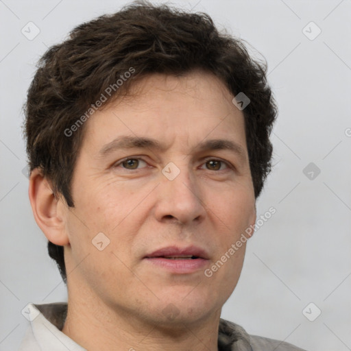 Neutral white adult male with short  brown hair and brown eyes