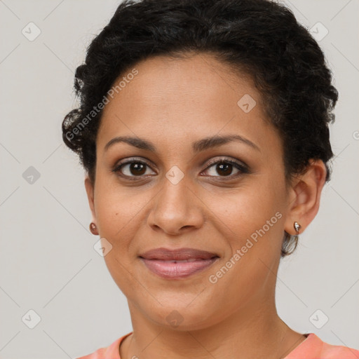 Joyful latino young-adult female with short  brown hair and brown eyes