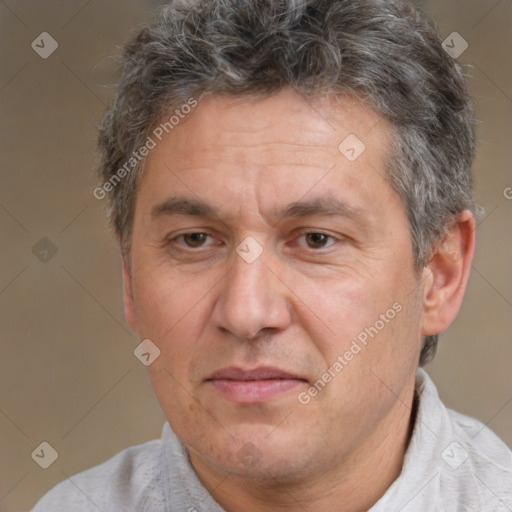 Joyful white middle-aged male with short  brown hair and brown eyes