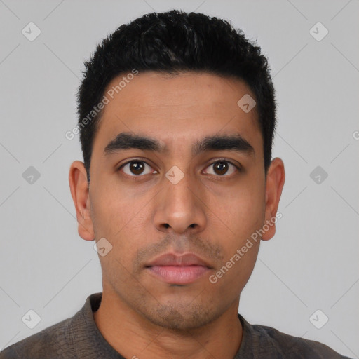 Neutral latino young-adult male with short  black hair and brown eyes