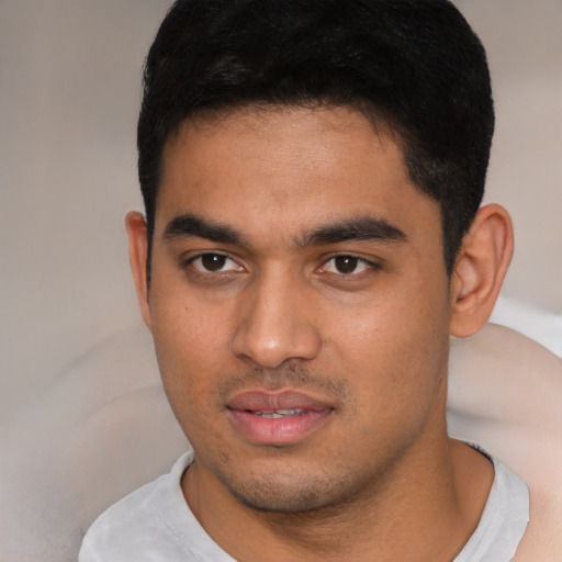 Neutral latino young-adult male with short  black hair and brown eyes