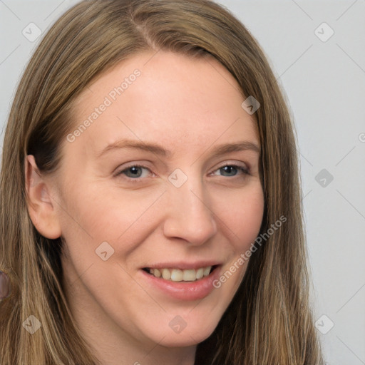 Joyful white young-adult female with long  brown hair and grey eyes