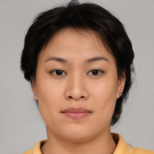 Neutral asian young-adult female with short  brown hair and brown eyes