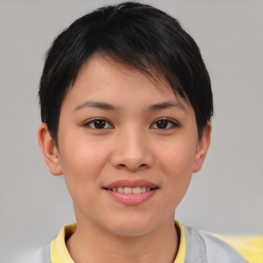 Joyful asian young-adult female with short  brown hair and brown eyes