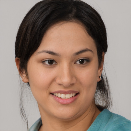 Joyful white young-adult female with medium  brown hair and brown eyes