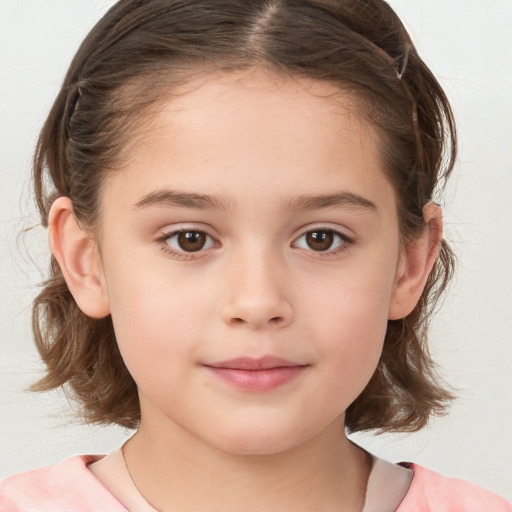 Joyful white child female with medium  brown hair and brown eyes