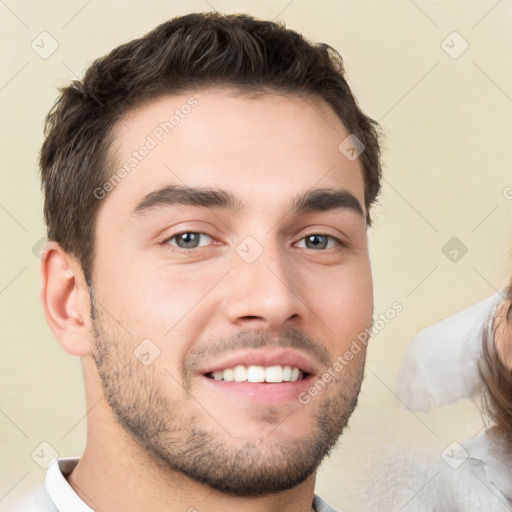 Neutral white young-adult male with short  brown hair and brown eyes