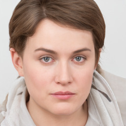 Neutral white young-adult female with medium  brown hair and grey eyes