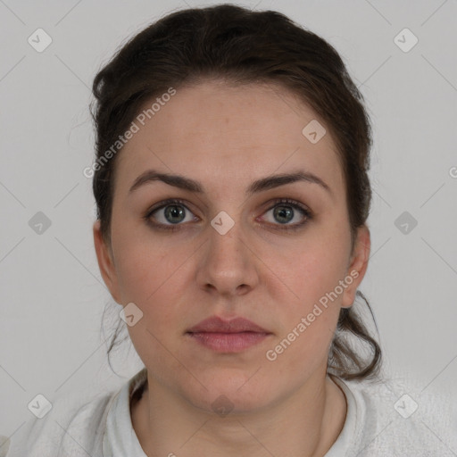 Neutral white young-adult female with short  brown hair and brown eyes