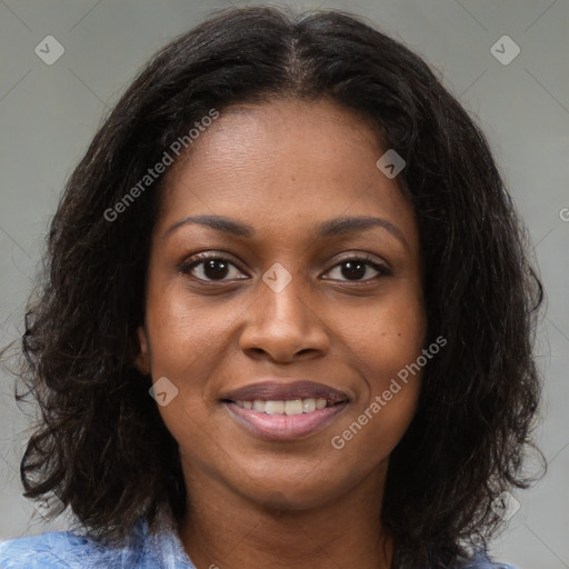 Joyful black young-adult female with medium  brown hair and brown eyes