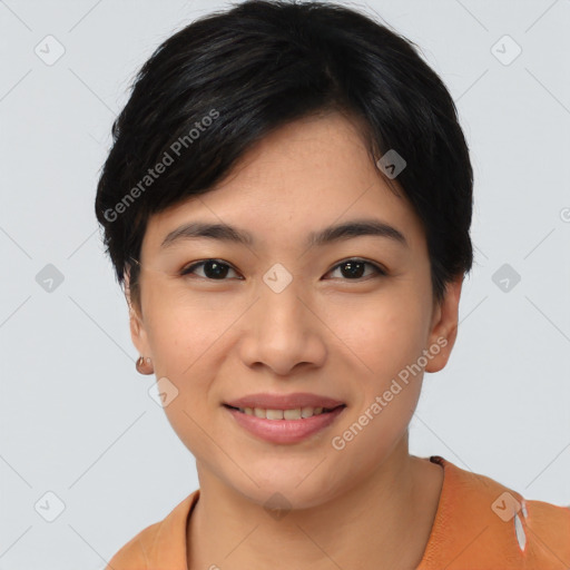 Joyful asian young-adult female with short  black hair and brown eyes