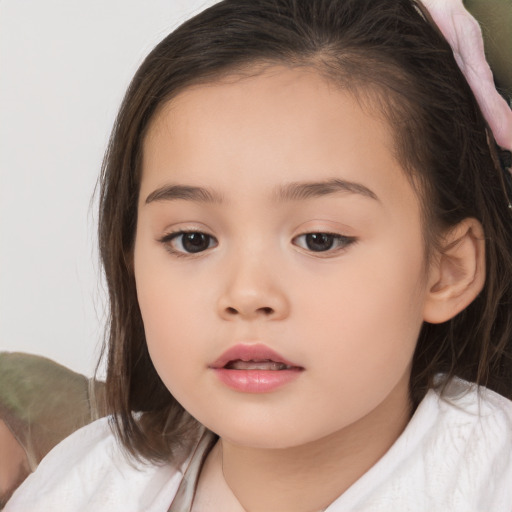 Neutral white child female with medium  brown hair and brown eyes