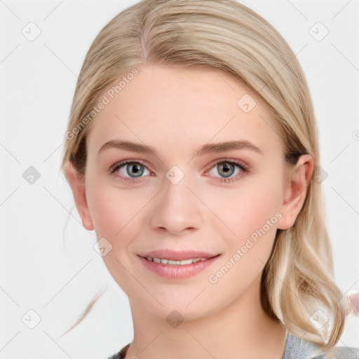 Joyful white young-adult female with medium  brown hair and blue eyes