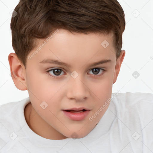 Joyful white child male with short  brown hair and brown eyes