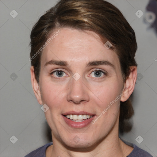 Joyful white adult female with medium  brown hair and grey eyes