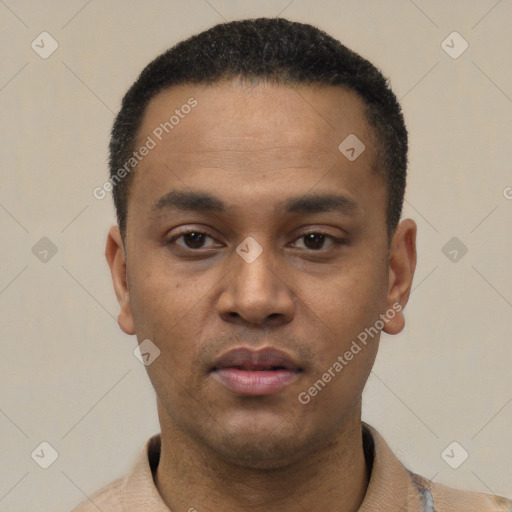 Neutral latino young-adult male with short  black hair and brown eyes