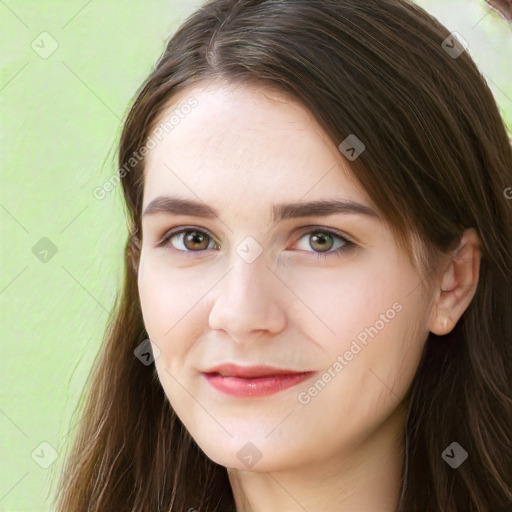 Joyful white young-adult female with long  brown hair and green eyes