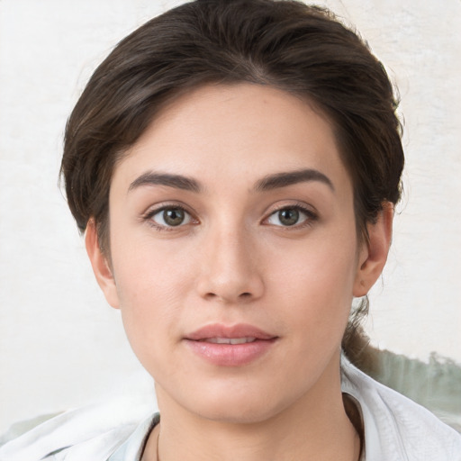 Neutral white young-adult female with short  brown hair and brown eyes