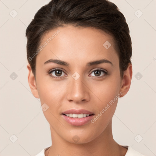 Joyful white young-adult female with short  brown hair and brown eyes