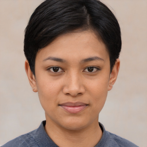 Joyful asian young-adult female with short  black hair and brown eyes