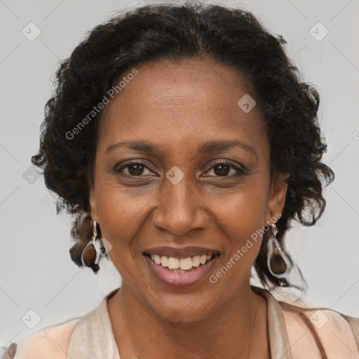 Joyful black adult female with short  brown hair and brown eyes