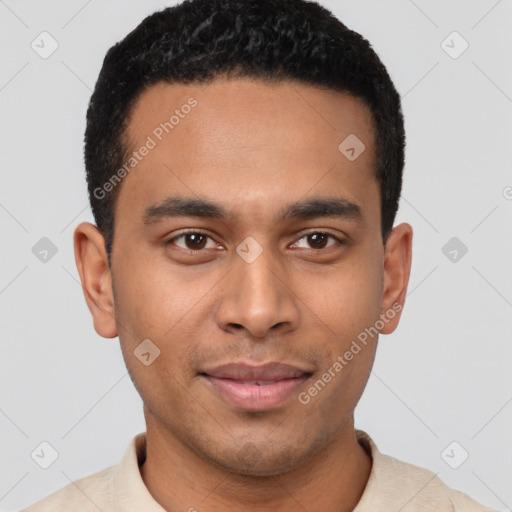 Joyful latino young-adult male with short  brown hair and brown eyes