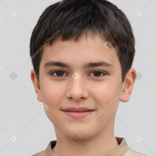 Joyful white child male with short  brown hair and brown eyes