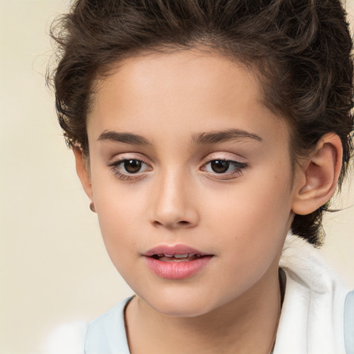 Joyful white child female with short  brown hair and brown eyes