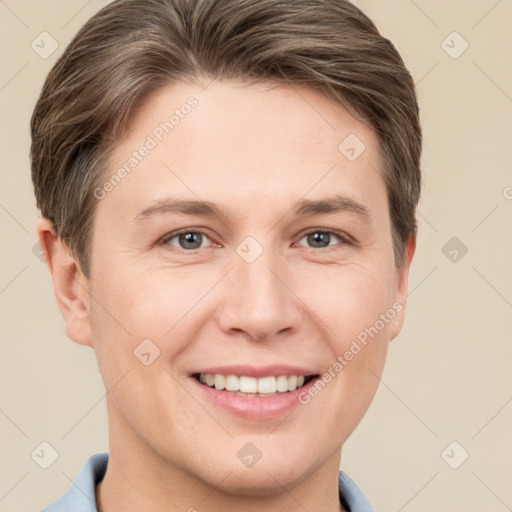 Joyful white young-adult female with short  brown hair and grey eyes